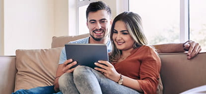 retired couple deposits check via mobile banking