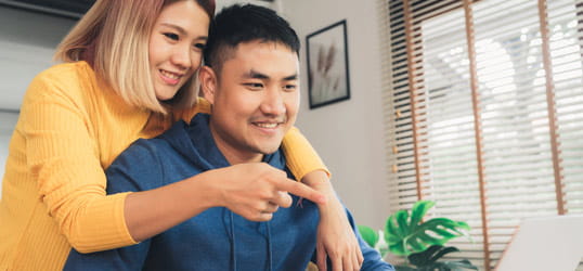couple with laptop